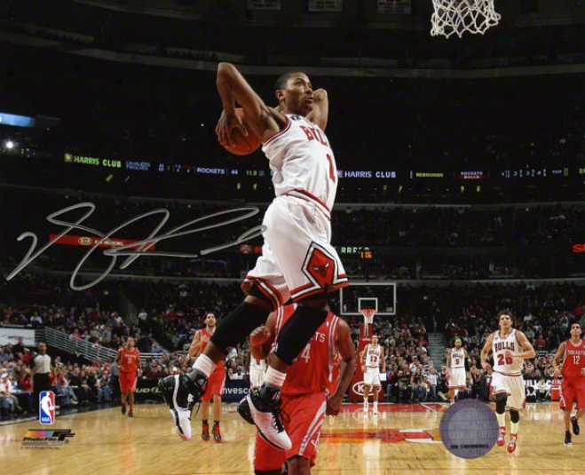 Derrick Rose Autographed 8x10 Photograph  Particulars: Chicago Bulls, Dunk