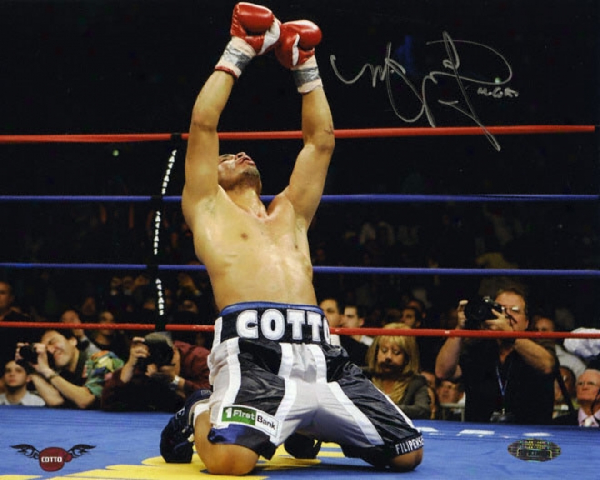 Miguel Cotto - On Knees Celebration - Autographed 8x10 Photograph