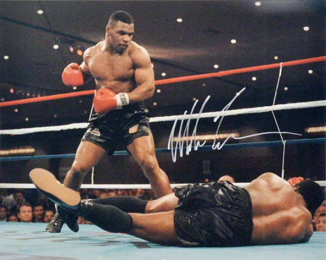 Mike Tyson 16x20 Autographed Photigraph  Details: Knockdown