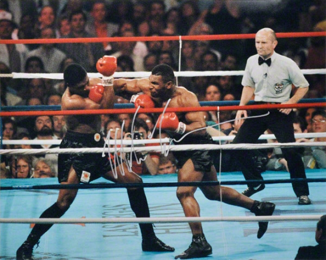 Mike Tyson 16x20 Autographed Photograph  Details: Punching