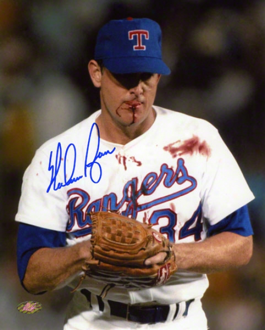 Nolan Ryan Autographed Photograph  Details: Texas Rangers, Blood Shot, 8x10, Signed In Blue